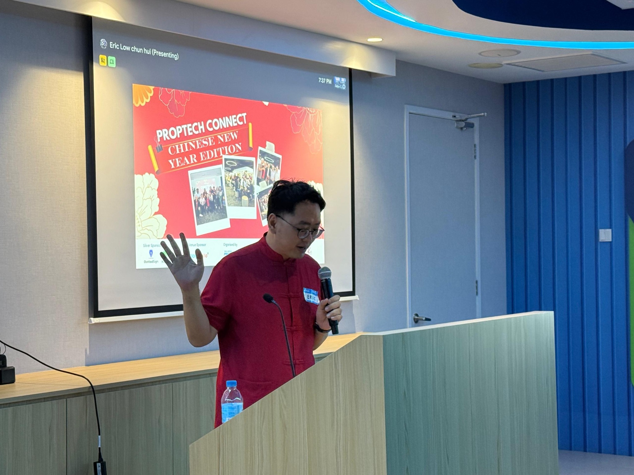 Eric Low emceeing a Malaysia PropTech Association PropTech Connect event